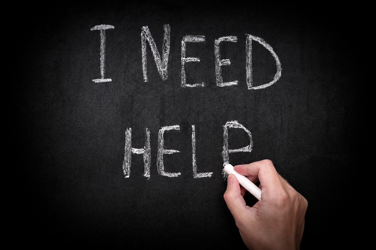 I need help written in chalk on a blackboard